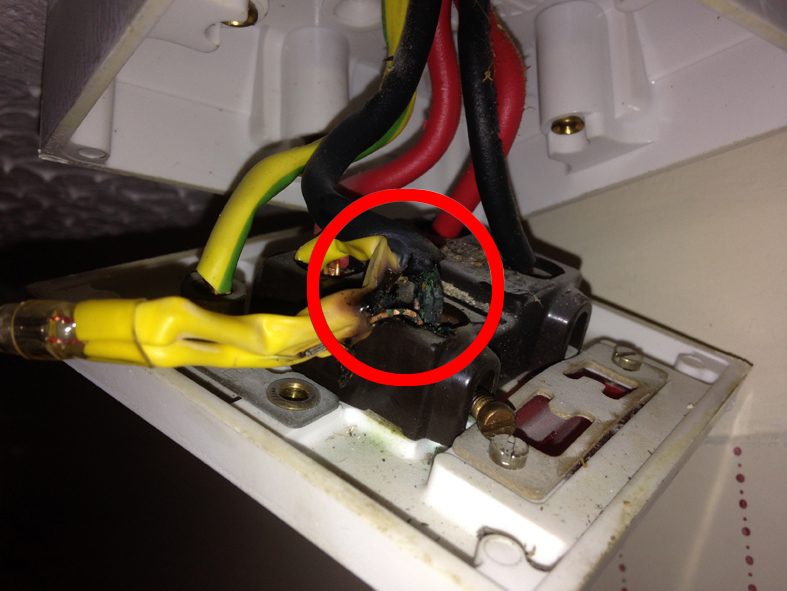 A burnt cooker switch found behind an old cooker