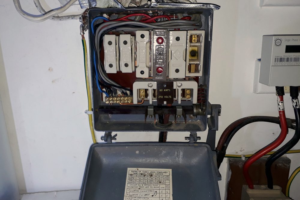 Old fuse board mid-replacement