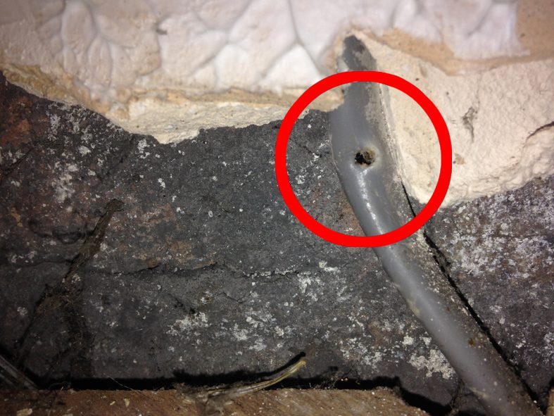 Cable drilled through by a later tradesperson