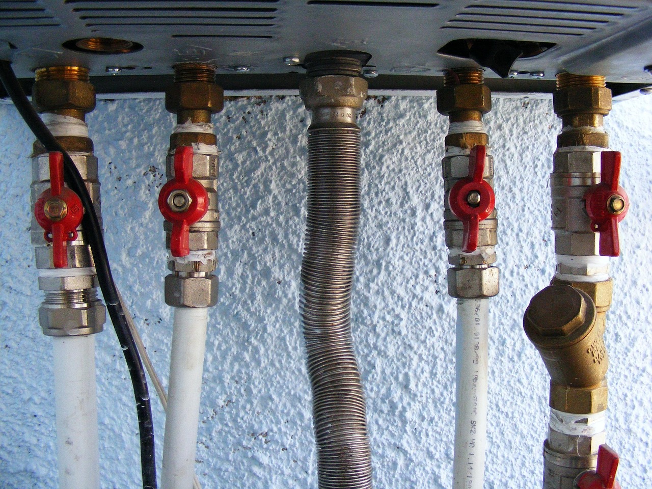 Gas boiler pipework — bonding clamps belong on these pipes